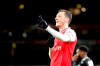 Arsenal's Mesut Ozil celebrates after scoring his side's third goal during the English Premier League soccer match between Arsenal and Newcastle at the Emirates Stadium in London, Sunday, Feb. 16, 2020.(AP Photo/Frank Augstein)