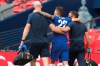 Chelsea's Christian Pulisic walks off the pitch after an injury during the FA Cup final soccer match between Arsenal and Chelsea at Wembley stadium in London, England, Saturday, Aug.1, 2020. (Catherine Ivill/Pool via AP)