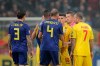 Referee Daniele Orsato, second from right, stops the game following alleged racist chants against Sweden's Alexander Isak during the Euro 2020 group F qualifying soccer match between Romania and Sweden on the National Arena stadium in Bucharest, Romania, Friday, Nov. 15, 2019. (AP Photo/Vadim Ghirda)