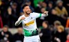 Moenchengladbach's Ramy Bensebaini celebrates after scoring his side's second goal during the German Bundesliga soccer match between Borussia Moenchengladbach and Bayern Munich at the Borussia Park in Moenchengladbach, Germany, Saturday, Dec. 7, 2019. (AP Photo/Martin Meissner)