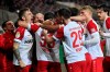 Essen's Oguzhan Kefkir, second from left, celebrates after scoring his side's first goal during the German Soccer Cup 3rd round match between RW Essen and Bayer Leverkusen in Essen, Germany, Tuesday, Feb. 2, 2021. (AP Photo/Martin Meissner, Pool)