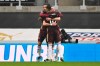 Leeds United's Jack Harrison, right, celebrates after scoring his side's second goal during the English Premier League soccer match between Newcastle United and Leeds United at St. James' Park in Newcastle, England, Tuesday, Jan. 26, 2021.(Stu Forster/Pool via AP)