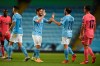 Manchester City's David Silva, left, clasps hands with Manchester City's Bernardo Silva at the end of the Champions League, round of 16, second leg soccer match between Manchester City and Real Madrid at the Etihad Stadium in Manchester, England, Friday, Aug. 7, 2020. (Oli Scarff/Pool Photo via AP)