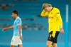 Dortmund's Erling Haaland is dejected after missing an opportunity to score during the Champions League, first leg, quarterfinal soccer match between Manchester City and Borussia Dortmund at the Etihad stadium in Manchester, Tuesday, April 6, 2021. (AP Photo/Dave Thompson)
