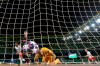 Atletico Madrid's goalkeeper Jan Oblak fails to stop a shot by Leipzig's Tyler Adams during the Champions League quarterfinal match between RB Leipzig and Atletico Madrid at the Jose Alvalade stadium in Lisbon, Portugal, Thursday, Aug. 13, 2020. (Miguel A. Lopes/Pool Photo via AP)