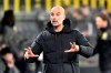 Manchester City's head coach Pep Guardiola gestures during the Champions League quarterfinal second leg soccer match between Borussia Dortmund and Manchester City at the Signal Iduna Park stadium in Dortmund, Germany, Wednesday, April 14, 2021. (AP Photo/Martin Meissner, Pool)