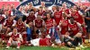 Arsenal's Pierre-Emerick Aubameyang holds the trophy celebrating with team mates players celebrate with the trophy after the FA Cup final soccer match between Arsenal and Chelsea at Wembley stadium in London, England, Saturday, Aug.1, 2020. (Catherine Ivill/Pool via AP)