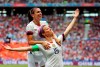 United States' Megan Rapinoe, right, celebrates after scoring the opening goal from the penalty spot during the Women's World Cup final soccer match between U.S. and The Netherlands at the Stade de Lyon in Decines, outside Lyon, France, July 7, 2019. (AP Photo/Francisco Seco)