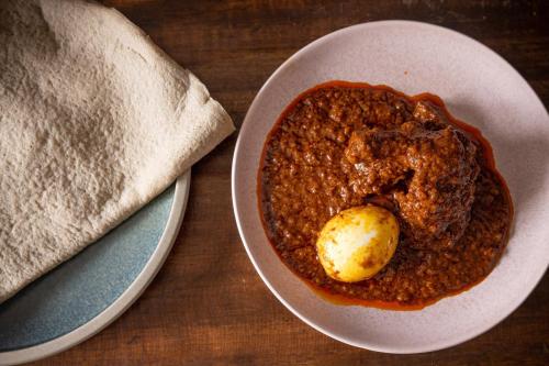 - Suresh Doss for the toronto star
Doro wat — chicken stewed with spices and egg — is served with injera bread at Desta Market in Toronto.