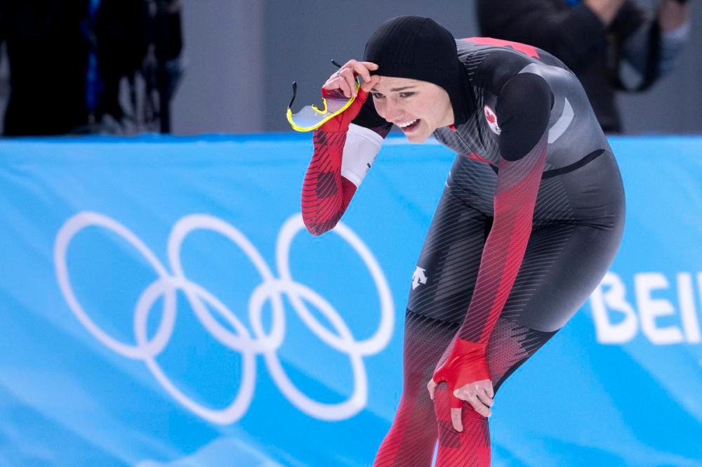 Paul Chiasson - THE CANADIAN PRESS
Isabelle Weidemann, of Canada, reacts at the end of her race to win the bronze medal in the women's 3,000 metre speedskating race at the 2022 Winter Olympics in Beijing on Saturday.