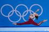 Gregory Bull - Associated Press File
Pauline Schaefer-Betz, of Germany, performs her floor exercise routine during the women’s artistic gymnastic qualifications at the 2020 Summer Olympics, in Tokyo. The German gymnastics team wore full-legged unitards that went down to their ankles, eschewing the traditional bikini cut that ends high on the hip.