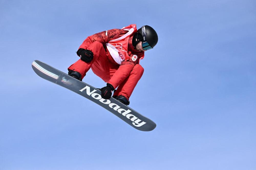 MARCO BERTORELLO - AFP via GETTY IMAGES
Canada's Max Parrot competes in the snowboard men's slopestyle final run during the Beijing 2022 Winter Olympic Games at the Genting Snow Park H & S Stadium in Zhangjiakou on Monday.