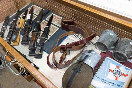 DANIEL CRUMP / Winnipeg Free PressA collection of knifes, reichsmarks, a canteen and other Nazi memorabilia up for auction at McSherry’s Auction House in Stonewall on Saturday.