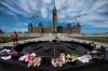 Justin Tang - THE CANADIAN PRESS
Shoes line the edge of the Centennial Flame on Parliament Hill in memory of the 215 children.