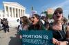Alex Brandon - AP
Demonstrators protest outside the U.S. Supreme Court after a leaked draft opinion suggested the court is prepared to overturn the 1973 opinion that gave women legal access to abortion.