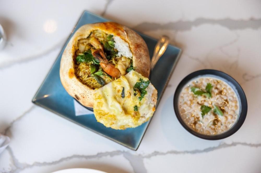 Suresh Doss - Special to the Star
Adrak Restaurant’s shrimp biryani served with lentil raita.