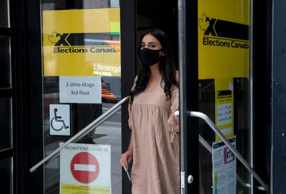 Adrian Wyld - THE CANADIAN PRESS File photo
Gurkiran Kaur Sidhu, wife of New Democrat Leader Jagmeet Singh, leaves an advance polling station after casting her ballot in Montreal.