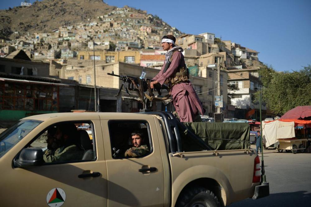 AFP Contributor#AFP - AFP via GETTY IMAGES
Taliban fighters patrol along a street in Kabul on Sept. 13, 2021. For all the anguished laments from scholars about the lack of debate, foreign affairs are almost never a vote-determining issue at the ballot box, Martin Regg Cohn writes.