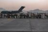 Sgt. Isaiah Campbell - AP
In this image provided by the U.S. Marine Corps, evacuees wait to board a Boeing C-17 Globemaster III, at Hamid Karzai International Airport, Kabul, Afghanistan, on Monday.