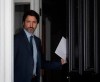 Prime Minister Justin Trudeau walks out the front door of Rideau Cottage as he makes his way to speak at a news conference at Rideau Cottage in Ottawa, Wednesday June 17, 2020. THE CANADIAN PRESS/Adrian Wyld