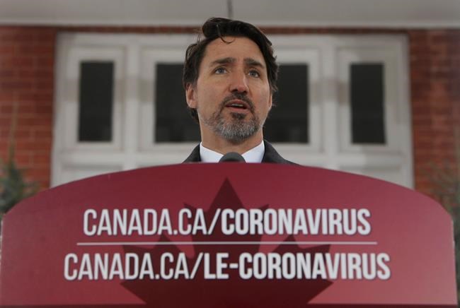 Prime Minister Justin Trudeau speaks to the media about the COVID-19 pandemic during a news conference outside Rideau cottage in Ottawa, Friday, March 20, 2020. THE CANADIAN PRESS/Adrian Wyld