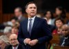 Finance Minister Bill Morneau rises during Question Period in the House of Commons Wednesday March 11, 2020 in Ottawa. THE CANADIAN PRESS/Adrian Wyld