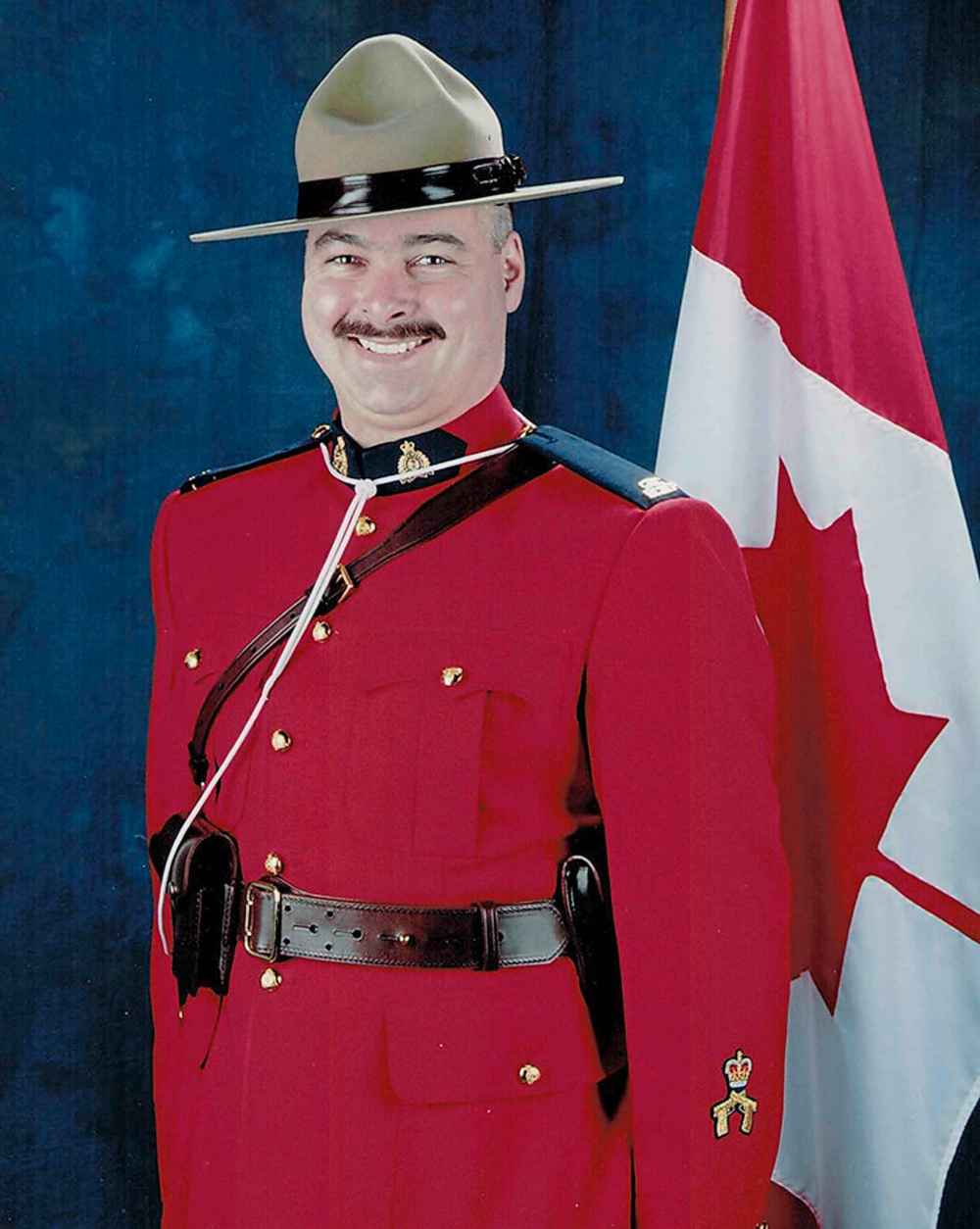 Allan Poapst, a father of three, worked for Manitoba RCMP for nearly 13 years before he was killed in a head-on car crash Friday afternoon. (RCMP handout photo)