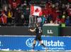 JASON FRANSON - THE CANADIAN PRESS
Canada's Alistair Johnston parades the flag to celebrate the win over Mexico during World Cup qualifying in Edmonton on Tuesday.