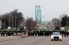 JEFF KOWALSKY - AFP via GETTY IMAGES
Police gather on Feb. 13, 2022 to clear protestors against COVID-19 vaccine mandates who blocked the entrance to the Ambassador Bridge in Windsor.