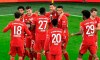 Bayern's scorer Robert Lewandowski, center, is touched in the face by Bayern's scorer David Alaba after their second goal during the German Bundesliga soccer match between Borussia Dortmund and Bayern Munich in Dortmund, Germany, Saturday, Nov. 7, 2020. (AP Photo/Martin Meissner, Pool)
