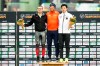 Winners gather on the podium after the 1000m men event with winner Kjeld Nuis from the Netherlands, second placed Laurent Dubreuil from Canada, left, and third placed Tatsuya Shinhama from Japan, right, during the World Cup skating all-round 2020 in the Viking ship at Hamar in Norway, Saturday Feb. 29, 2020. Tatsuya Shinhama at right, was also crowned World Champion overall sprint. (Geir Olsen / NTB scanpix via AP)