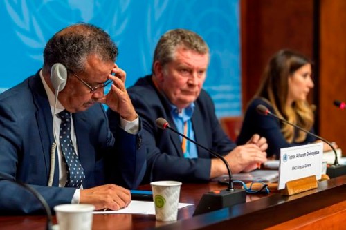 WHO executives, from left, Tedros Adhanom Ghebreyesus, Director General of the World Health Organization (WHO) with Michael Ryan, Executive Director, WHO Health Emergencies Programme, and Maria van Kerkhove, Head of the Outbreak Investigation Task Force, during a press conference about the new Coronavirus, at the European headquarters of the United Nations in Geneva, Switzerland, Wednesday, Jan. 29, 2020. Efforts to contain a new and deadly virus have intensified Wednesday, as quarantine facilities are set up, many airlines have suspended or significantly cut back flights from China and efforts continue to find a medical remedy. (Martial Trezzini/Keystone via AP)