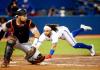 Vaughn Ridley - GETTY IMAGES
Bo Bichette dives head first for home to score on a single by Teoscar Hernandez in the fourth inning Wednesday.