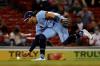 Winslow Townson - The Associated Press
Blue Jays shortstop Bo Bichette bobbles a ground ball hit by Boston Red Sox's J.D. Martinez in the fifth inning Tuesday. Bichette had two of Toronto’s four hits, including a fourth-inning homer.