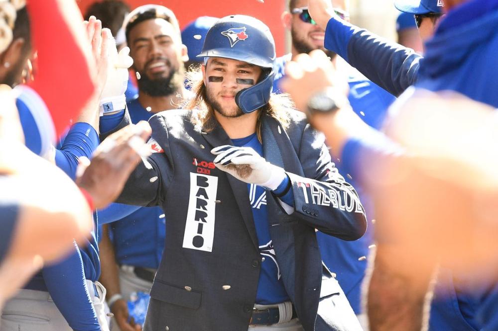 Brian Rothmuller - Getty Images
Blue Jay Bo Bichette dressed appropriately for the dugout celebration after his game-tying home run in the eighth inning against the Angels on Sunday.