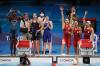 Tom Pennington - GETTY IMAGES
Members of U.S. and Canadian women’s 4x100 swim relay teams react during Sunday’s final in Tokyo. Canada finished with a silver medal.