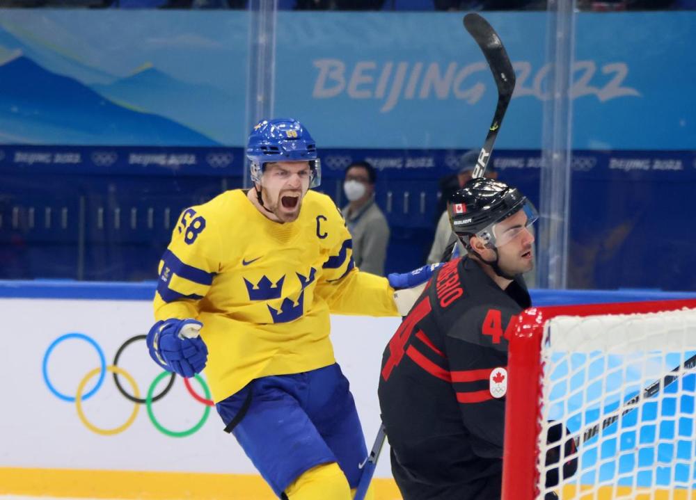 Bruce Bennett - GETTY IMAGES
Sweden’s Anton Lander celebrates a third-period goal against Canada in the men’s quarterfinals at the Winter Olympics in Beijing.