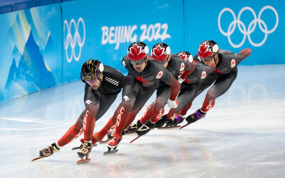 Paul Chiasson - THE CANADIAN PRESS
Canada’s Charles Hamelin, left, and Maxime Laoun lead the team around the track during a short-track speedskating practice session at the 2022 Winter Olympics in Beijing on Tuesday.