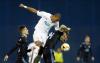 Darko Bandic - Associated Press file photo
Plzen midfielder Jean-David Beauguel (C) jumps for the ball with Dinamo Zagreb's Amer Gojak (R) during a match between Dinamo Zagreb and Viktoria Plzen in Zagreb, Croatia, on Feb. 21, 2019. Soccer’s disrupted schedule during the pandemic means draws and games in qualifying for the 2020-21 Champions League have started before the previous edition resumes Wednesday at the quarterfinals stage.