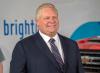 Frank Gunn - THE CANADIAN PRESS
Premier Doug Ford listens during an announcement at General Motors Canada’s Canadian Technical Centre, McLaughlin Advanced Technology Track in Oshawa on April 4, 2022.