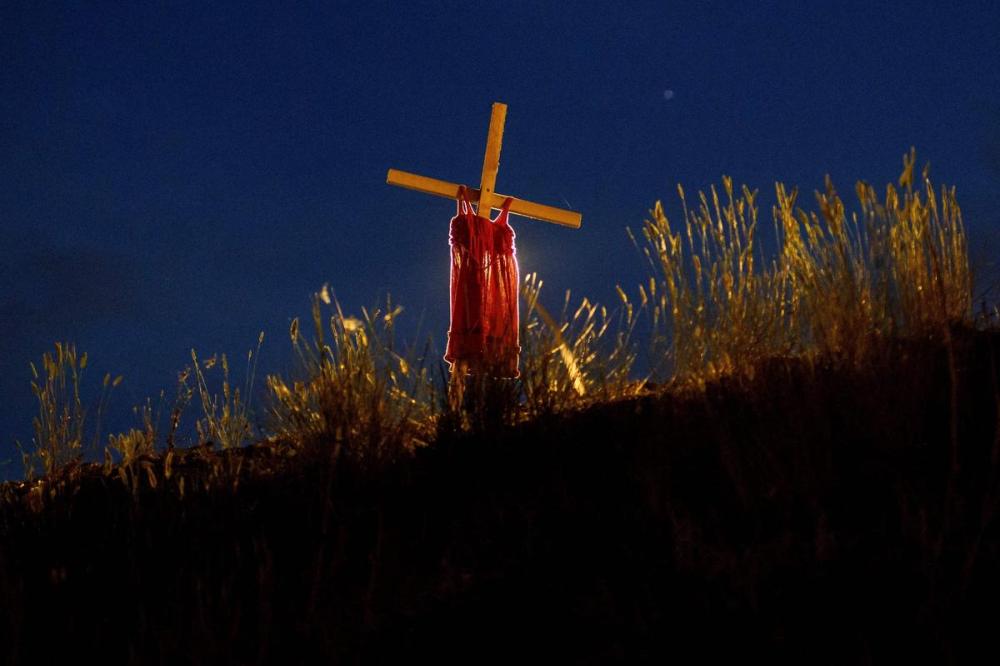 COLE BURSTON - AFP/Getty Images file photo
A child’s dress is seen on the side of Hwy. 5 in early June near the former Kamloops Residential School, placed there to represent a genocide against First Nations people in Canada.