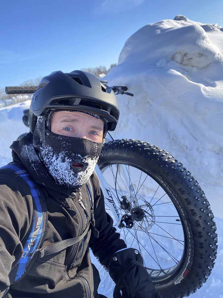 Cyclist Jordan Sawatzky with drifts along the Yellow Ribbon Greenway Trail between Sharp and Whytewold. (Supplied)