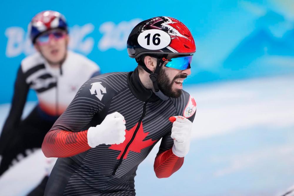 Paul Chiasson - THE CANADIAN PRESS
Canada's Steven Dubois reacts after winning the silver medal in the men's 1,500-metre short-track speedskating event at the Beijing Winter Olympics in Beijing, China, on Wednesday, Feb. 9, 2022.