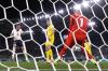 Lars Baron - GETTY IMAGES
Harry Kane scores his second goal against Ukraine, heading the ball past Georgiy Bushchan in England’s 4-0 quarterfinal win.