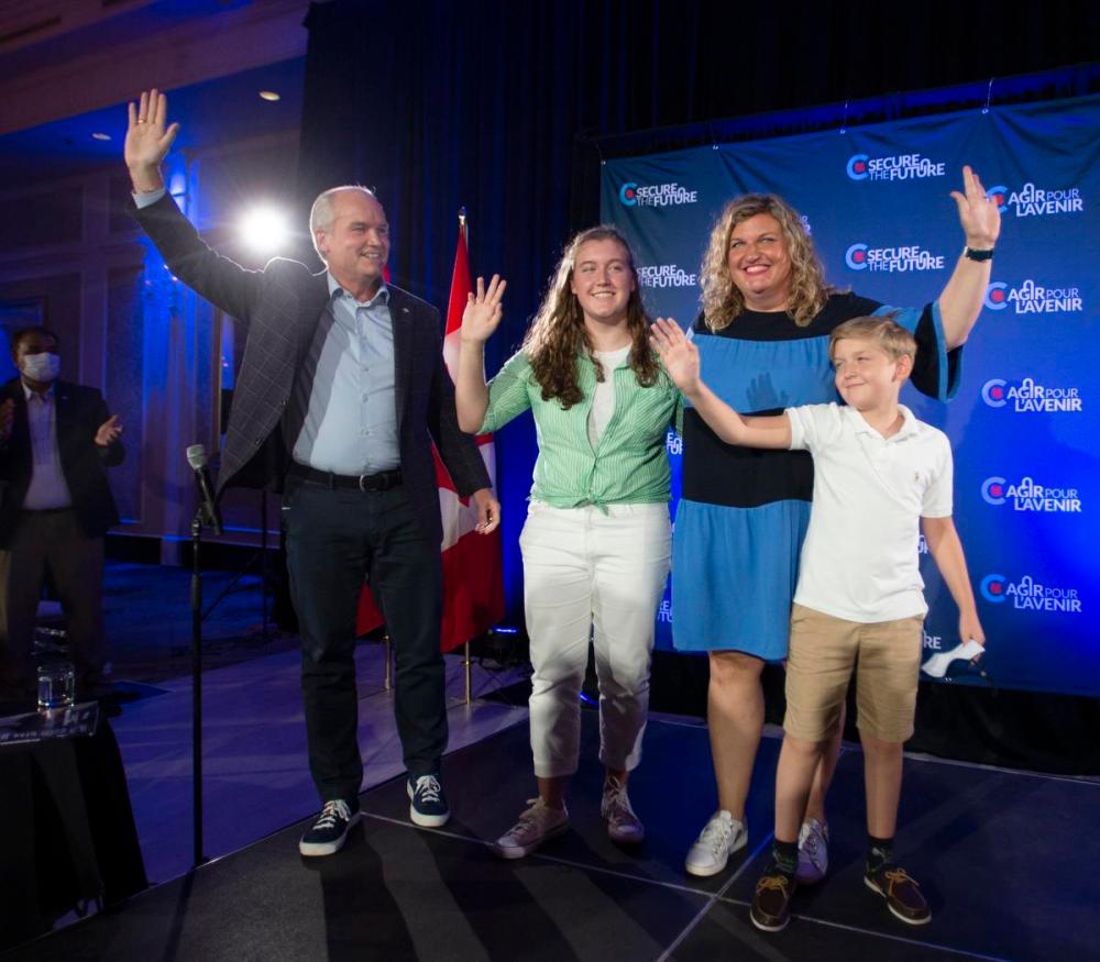 Ryan Remiorz - THE CANADIAN PRESS
Conservative Leader Erin O'Toole, his daughter Mollie, son, Jack and his wife Rebecca, wave to supporters at a campaign rally in Markham, Ont. on Aug. 30, 2021.