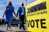 Frank Gunn - THE CANADIAN PRESS
Conservative Leader Erin O'Toole and his wife Rebecca arrive to vote in the federal election in Bowmanville, ON, on Sept. 20, 2021.