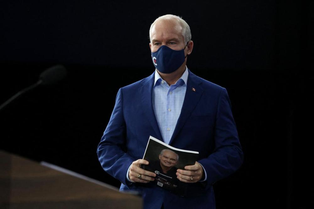DAVE CHAN - AFP via GETTY IMAGES
Conservative Party of Canada Leader Erin O'Toole arrives for a news conference in Ottawa on Aug. 31, 2021.