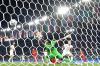 FILIPPO MONTEFORTE - AFP via GETTY IMAGES
Italy forward Ciro Immobile, right, scores his country’s second goal in a 3-0 shutout of Turkey on Friday.