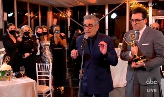 In this video grab captured on Sept. 20, 2020, courtesy of the Academy of Television Arts & Sciences and ABC Entertainment, Annie Murphy, from left, Catherine O'Hara, Noah Reid, Sarah Levy, Karen Robinson, Eugene Levy and Daniel Levy accept the award for outstanding comedy series for