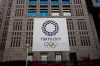 A banner promoting the Tokyo 2020 Olympics hands on the facade of the Tokyo Metropolitan Government building Wednesday, March 25, 2020, in Tokyo. Not even the Summer Olympics could withstand the force of the new coronavirus. After weeks of hedging, the IOC took the unprecedented step of postponing the world's biggest sporting event, a global extravaganza that's been cemented into the calendar for more than a century. (AP Photo/Jae C. Hong)